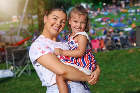 Mother and daughter at summer concert