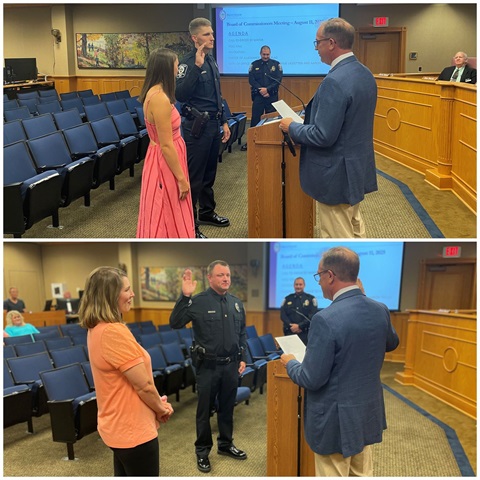 two officers being sworn in.