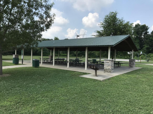 Covered shelter with picnic tables