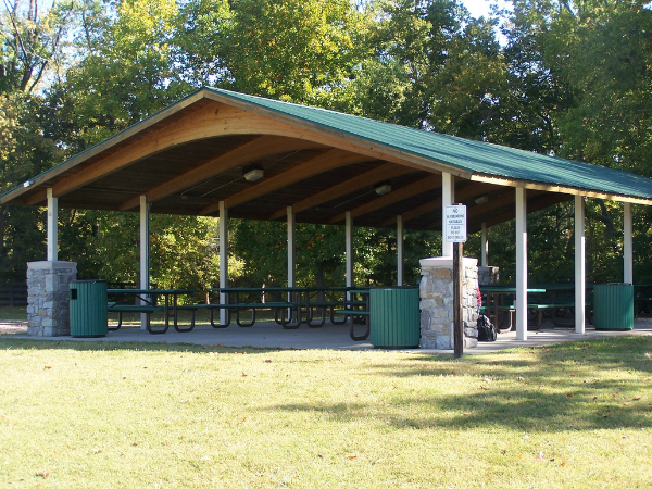 Covered shelter with picnic tables
