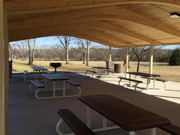 Covered shelter with picnic tables